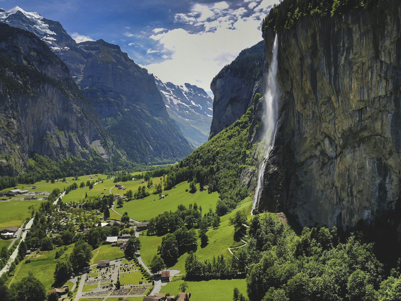 The Staubbach Falls dropping from a cliff into the Lauterbrunnen valley