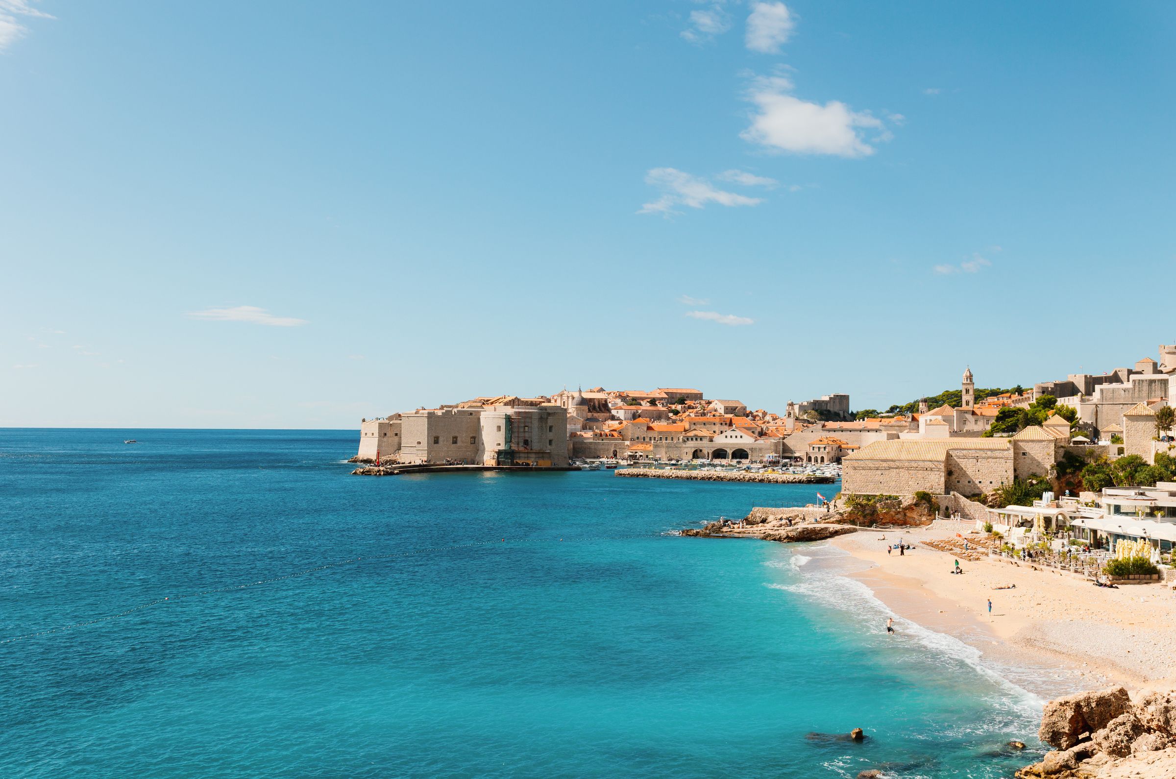 The beach east of the walls, the old town on its promontory across the water