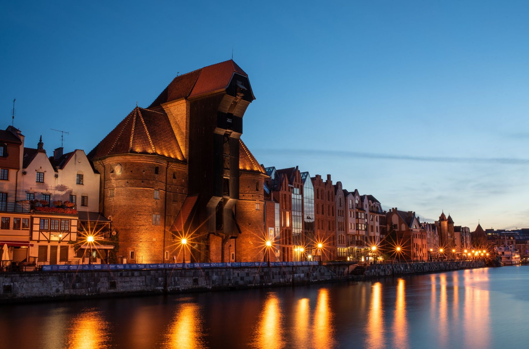 The medieval crane on the Motława waterfront in Gdańsk at night
