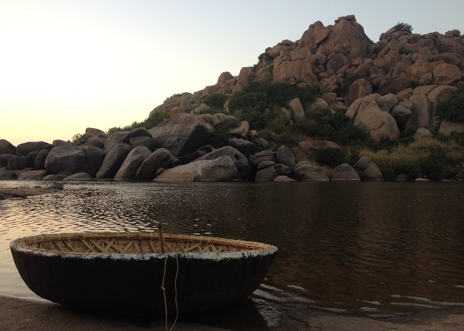 A round coracle boat on the Tungabhadra river at Hampi