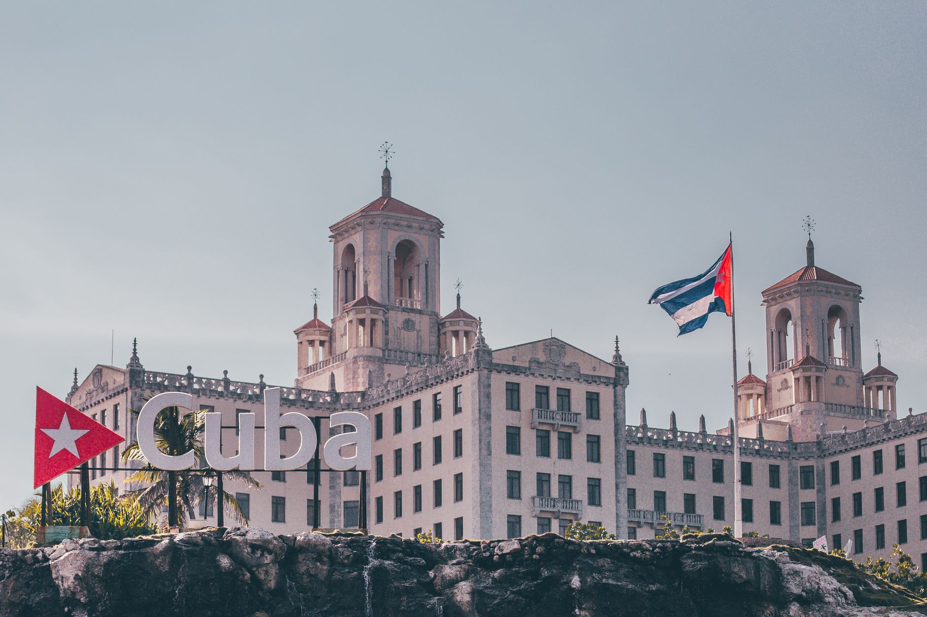 The twin towers of the Hotel Nacional de Cuba in Havana with a Cuban flag flying