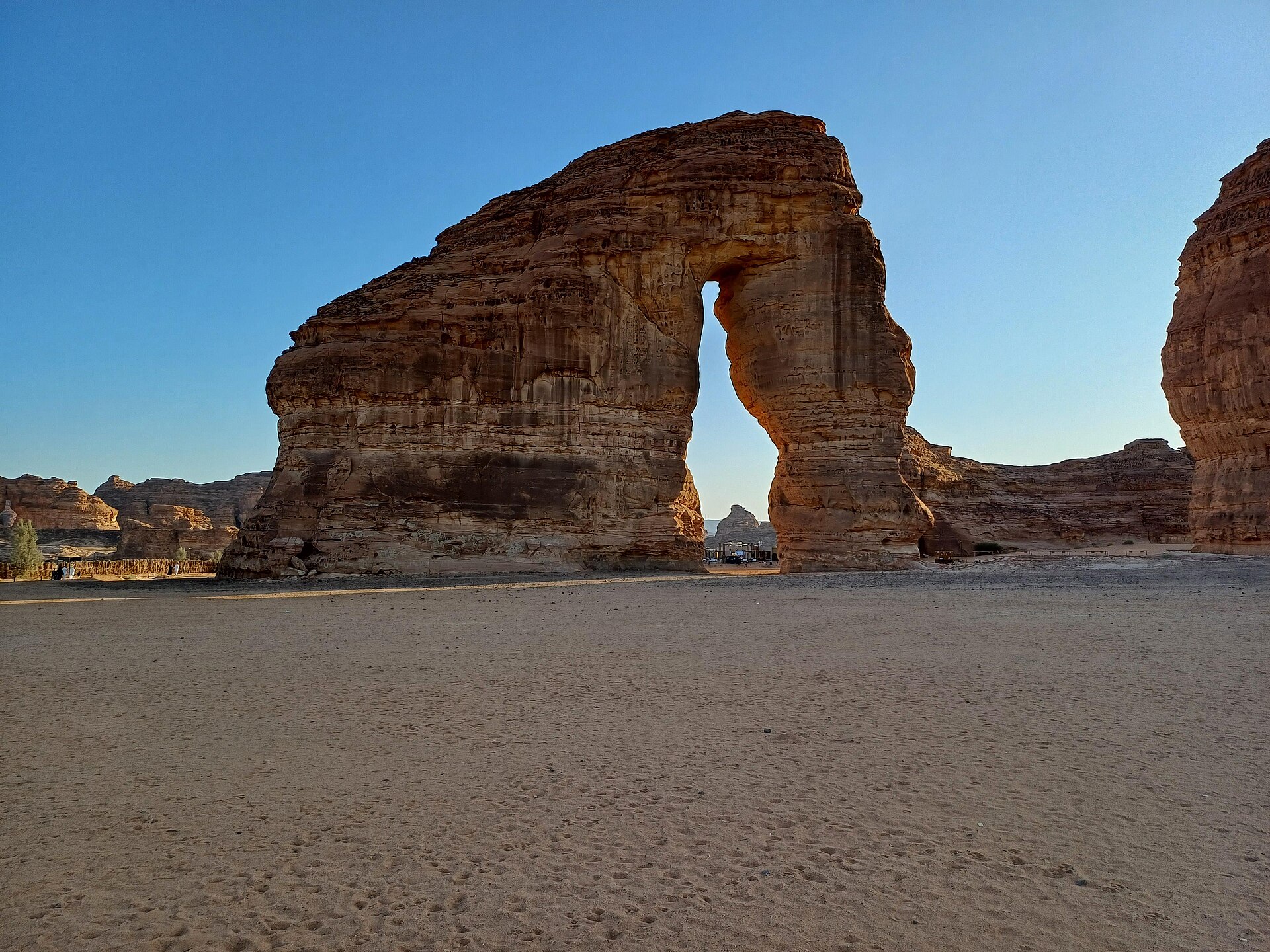 Jabal AlFil, the Elephant Rock natural sandstone arch in AlUla, Saudi Arabia, in late afternoon light