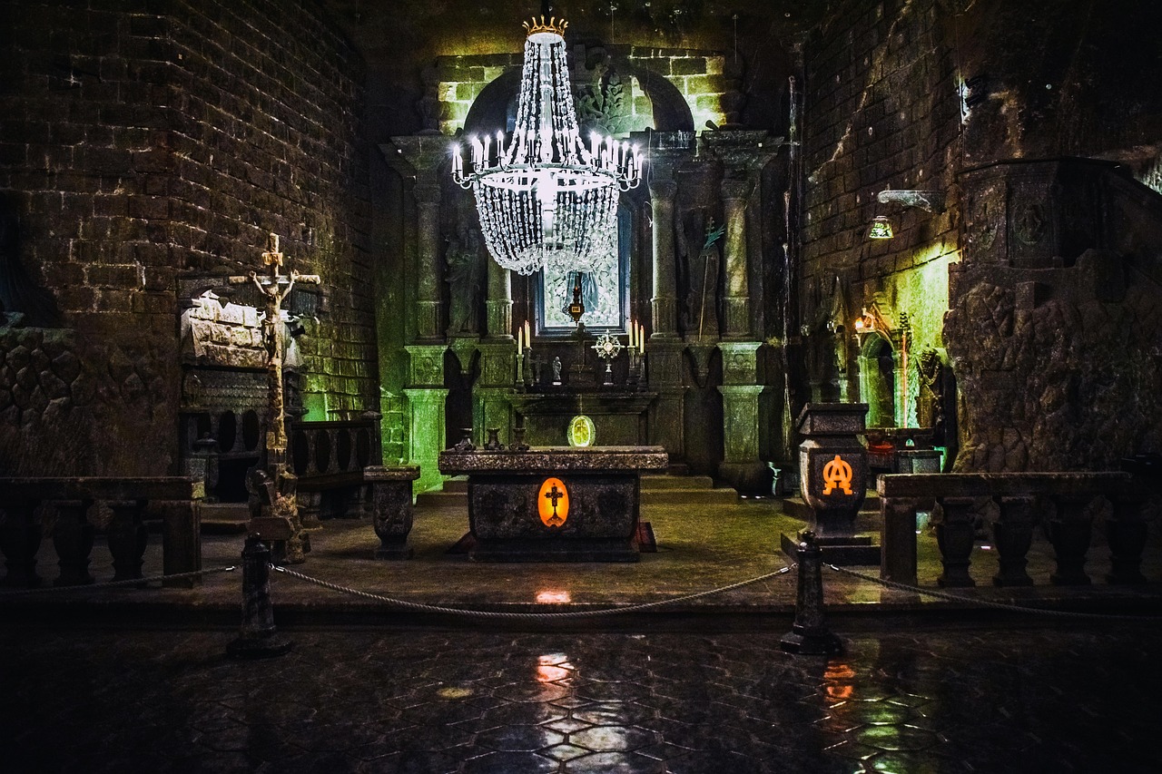 An underground chapel carved from rock salt, with a crystal chandelier, a salt-carved altar and stone-cut balustrades