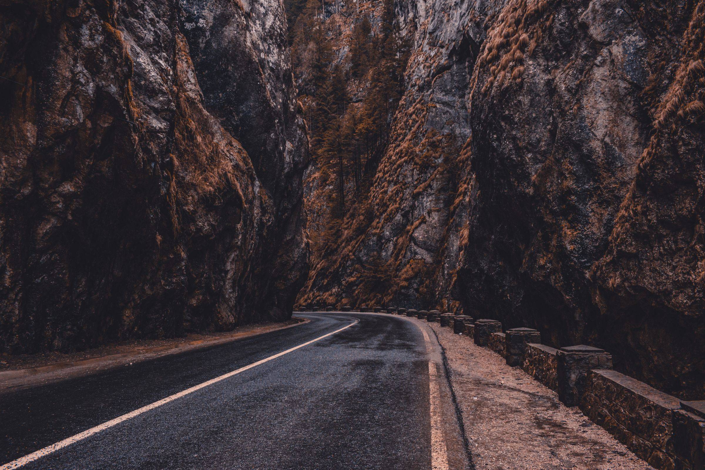 The road through Bicaz Gorge, running between sheer limestone walls with a low stone parapet on one side