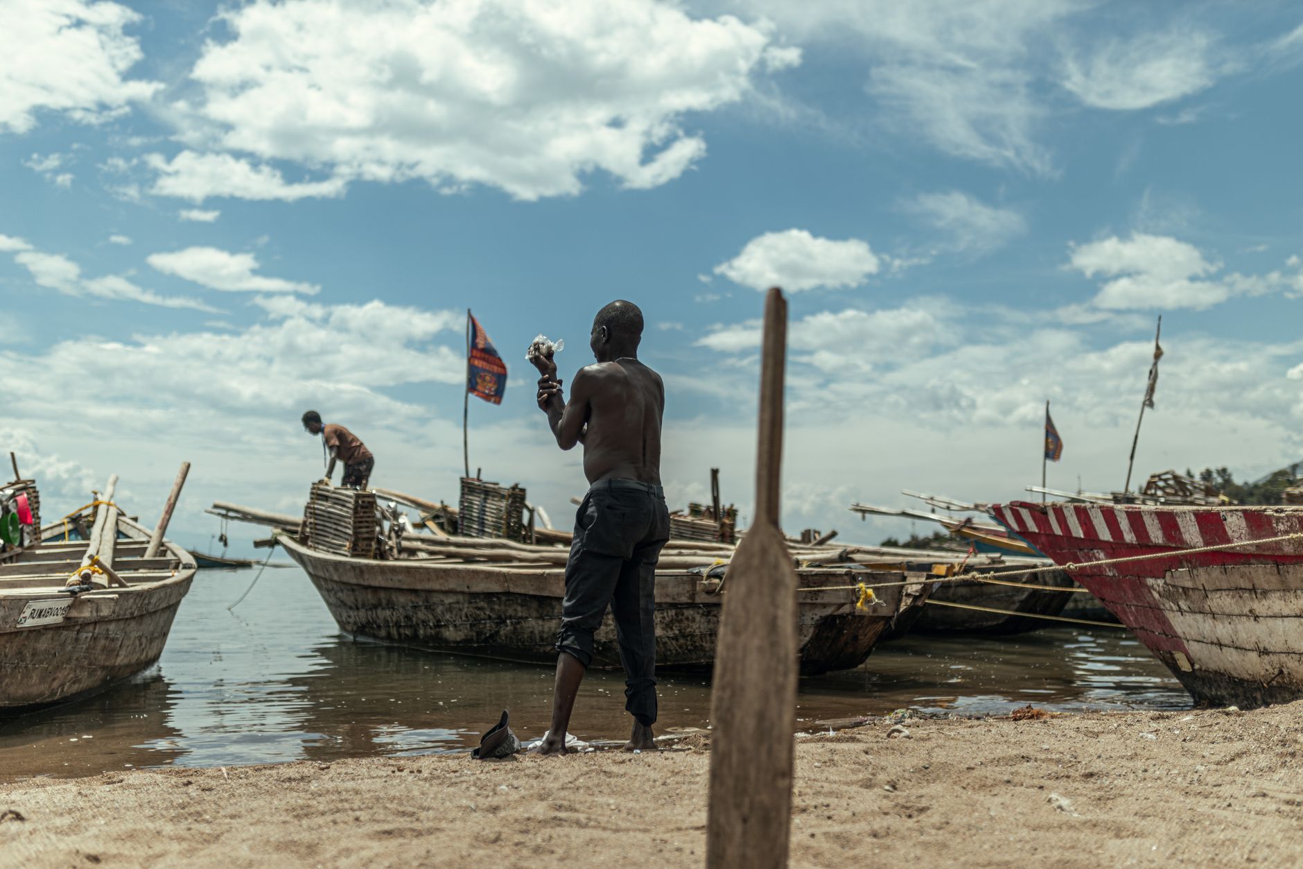 Wooden fishing boats on the shore of Lake Victoria