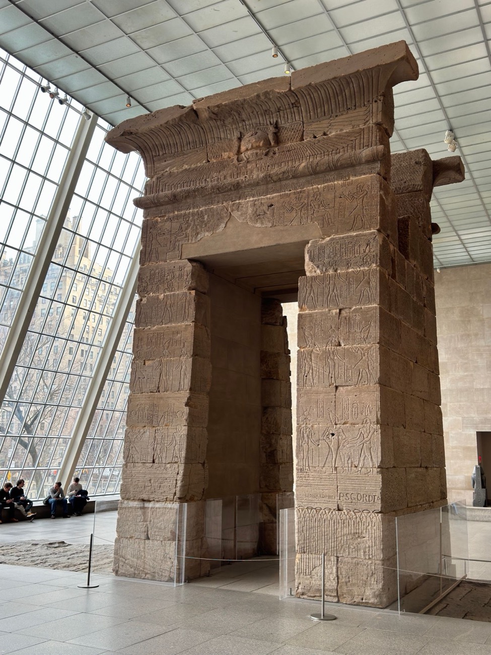 The gateway of the Temple of Dendur in its glass-walled hall at the Met