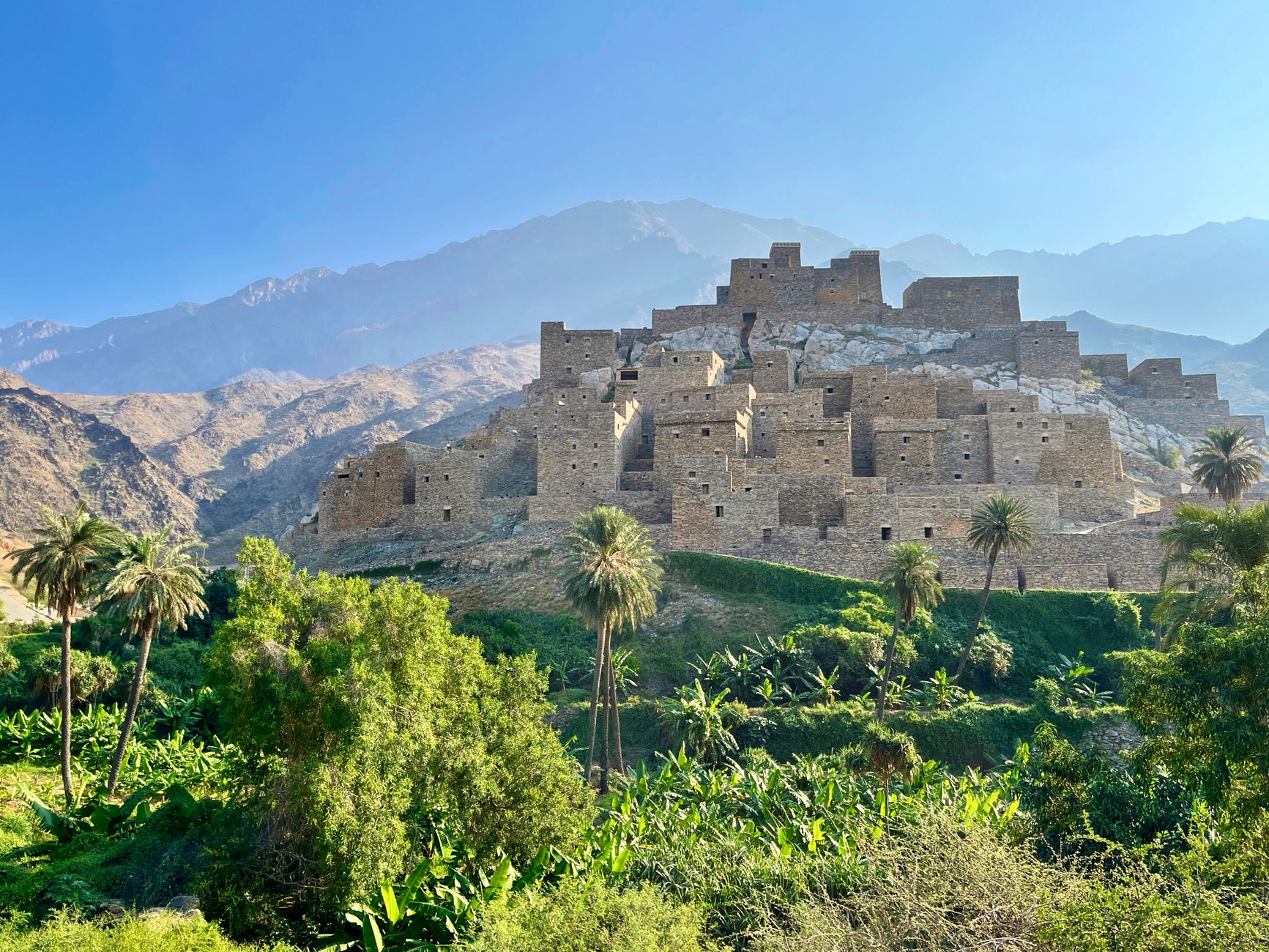 The stacked mud houses and date terraces of Misfat al Abriyeen