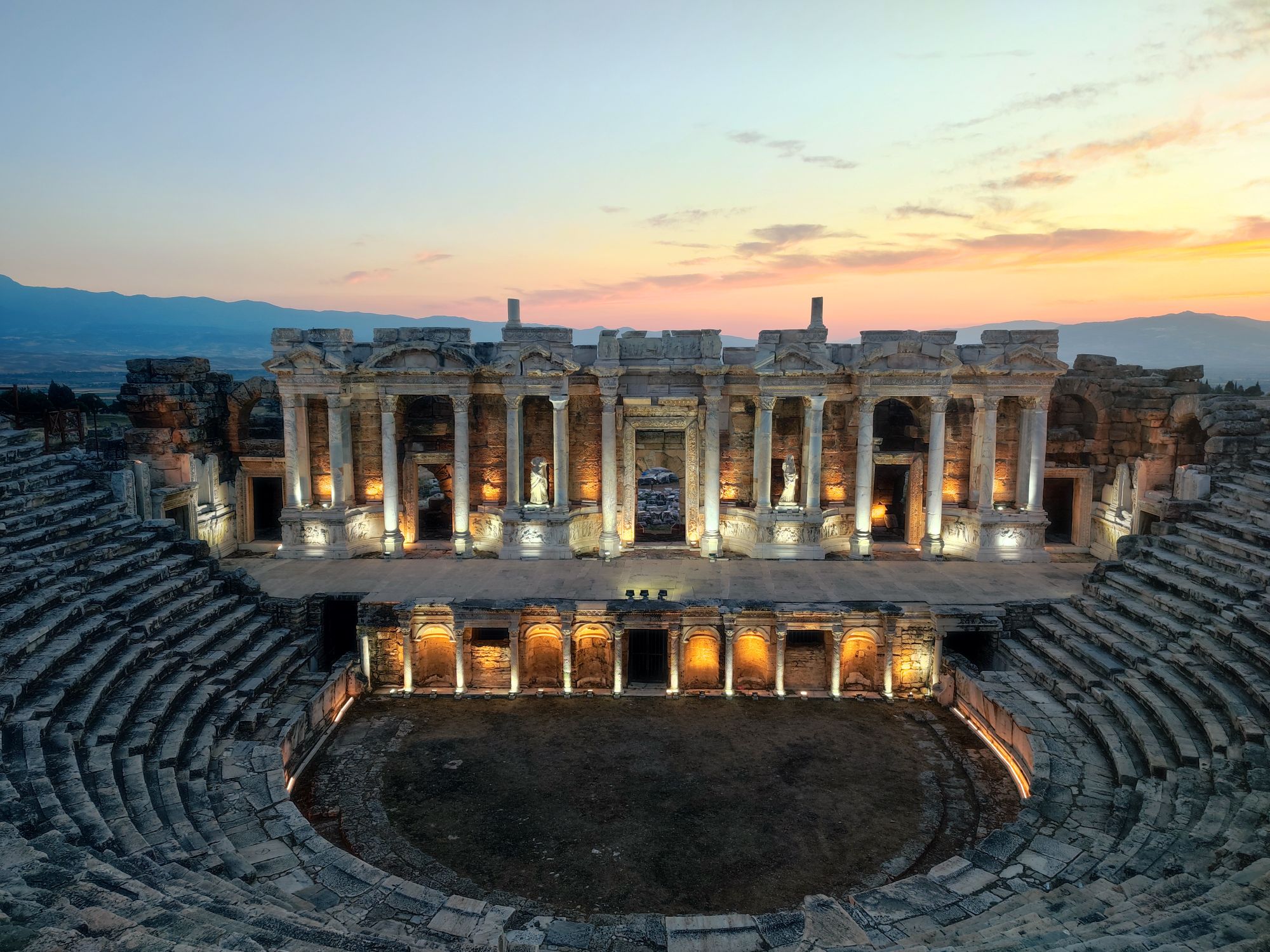 The Roman theatre of ancient Hierapolis above Pamukkale, lit at dusk