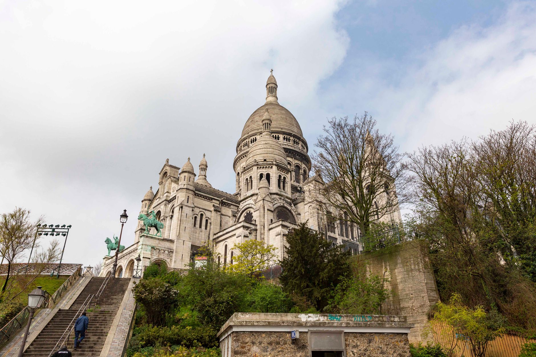The Sacré-Cœur seen through the trees of the hill