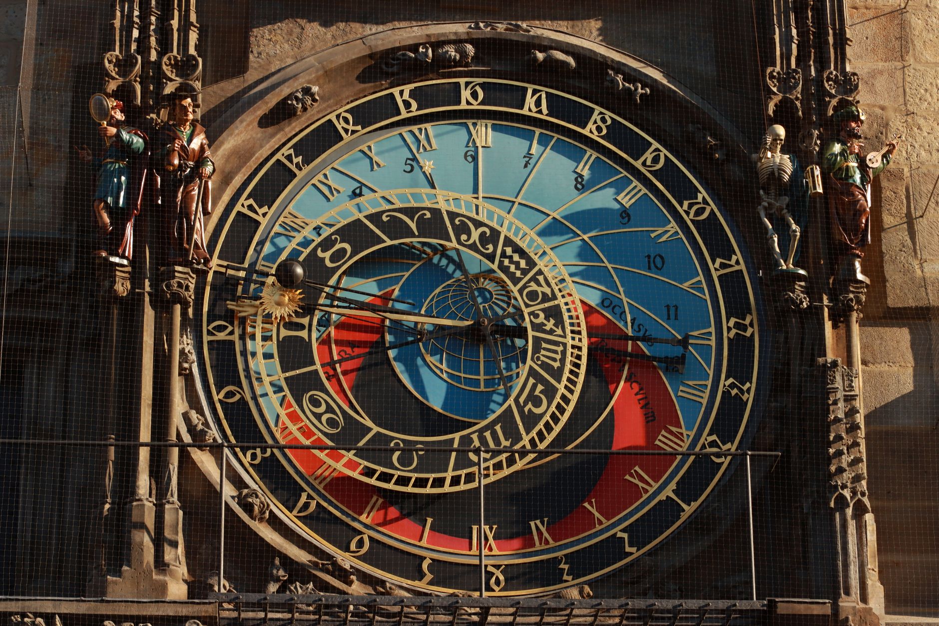 Close view of Prague's Astronomical Clock, its gilded dial and zodiac ring on the Old Town Hall tower