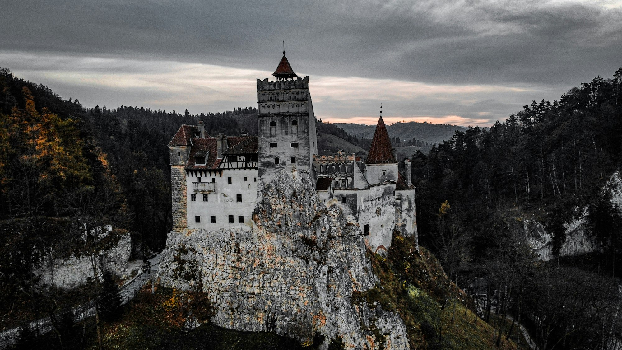 Bran Castle, a whitewashed fortress on a rock near Brasov, Romania
