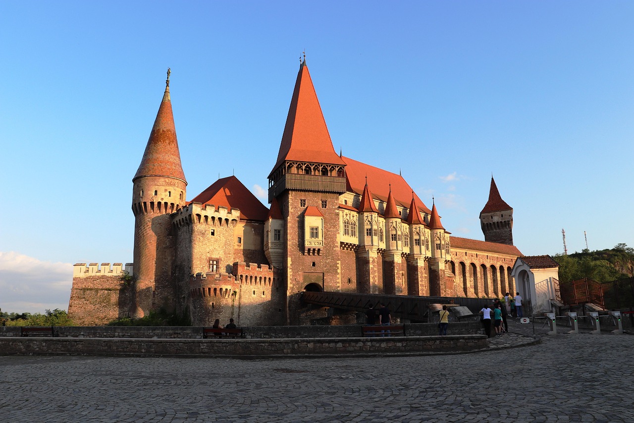 Corvin Castle, a gothic fortress with a wooden bridge over a moat at Hunedoara