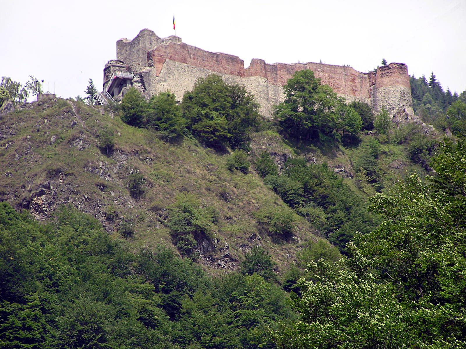 The ruined walls of Poenari Citadel on a crag above the Arges gorge