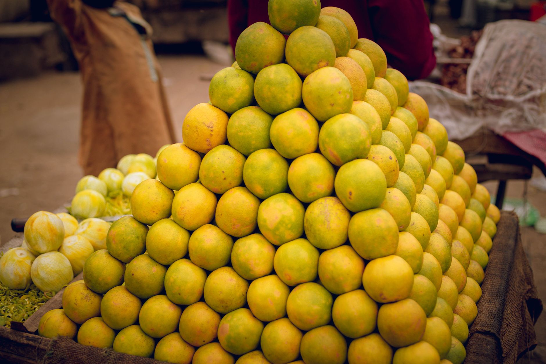 Lemons stacked on a market stall
