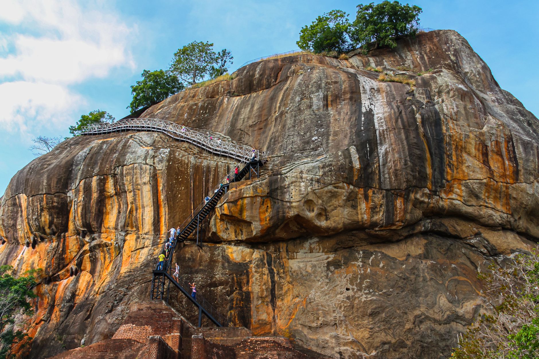 Metal walkway and staircase bolted to the sheer face of Sigiriya rock
