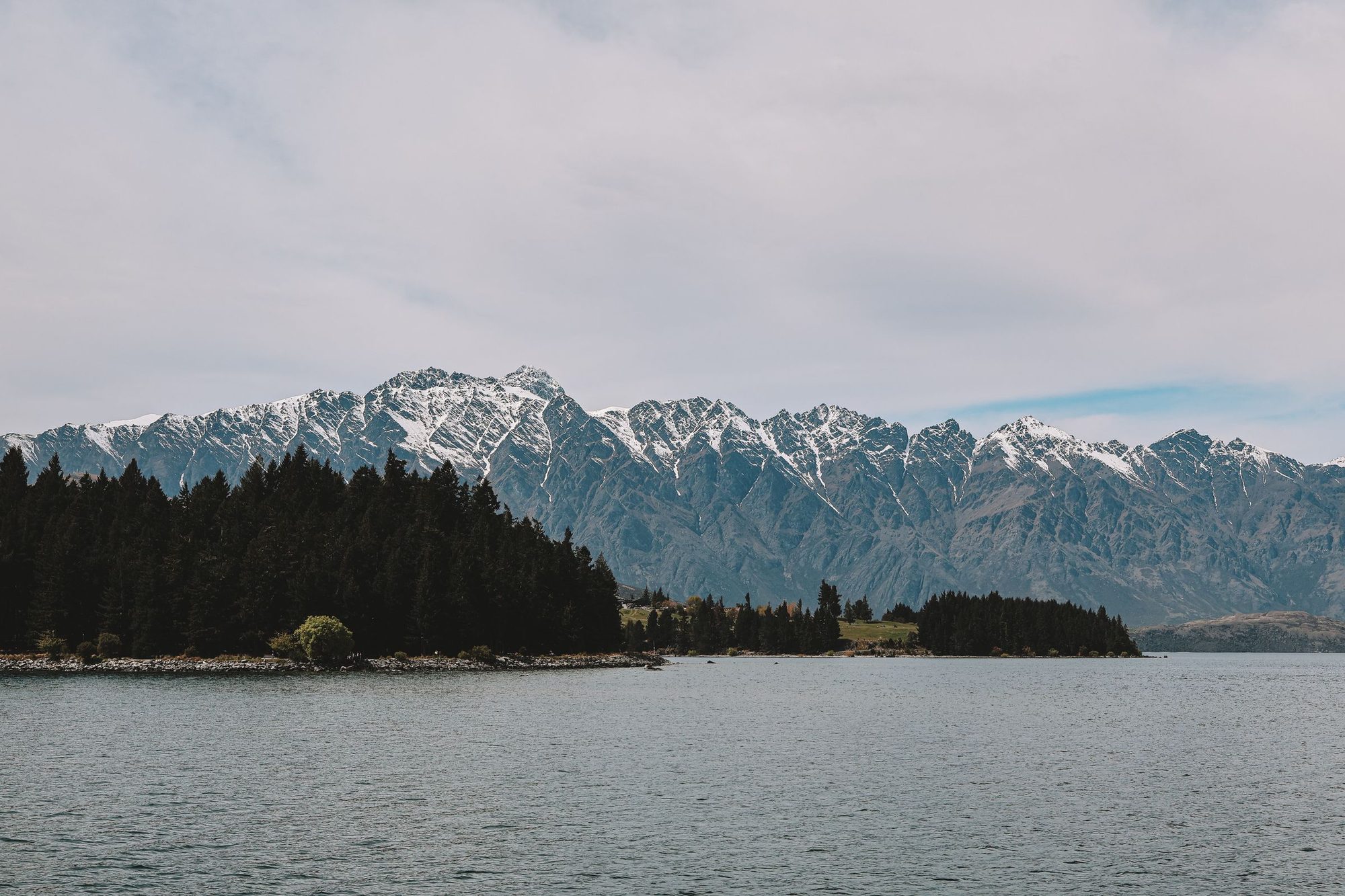 The Remarkables under fresh snow across Lake Wakatipu from Queenstown