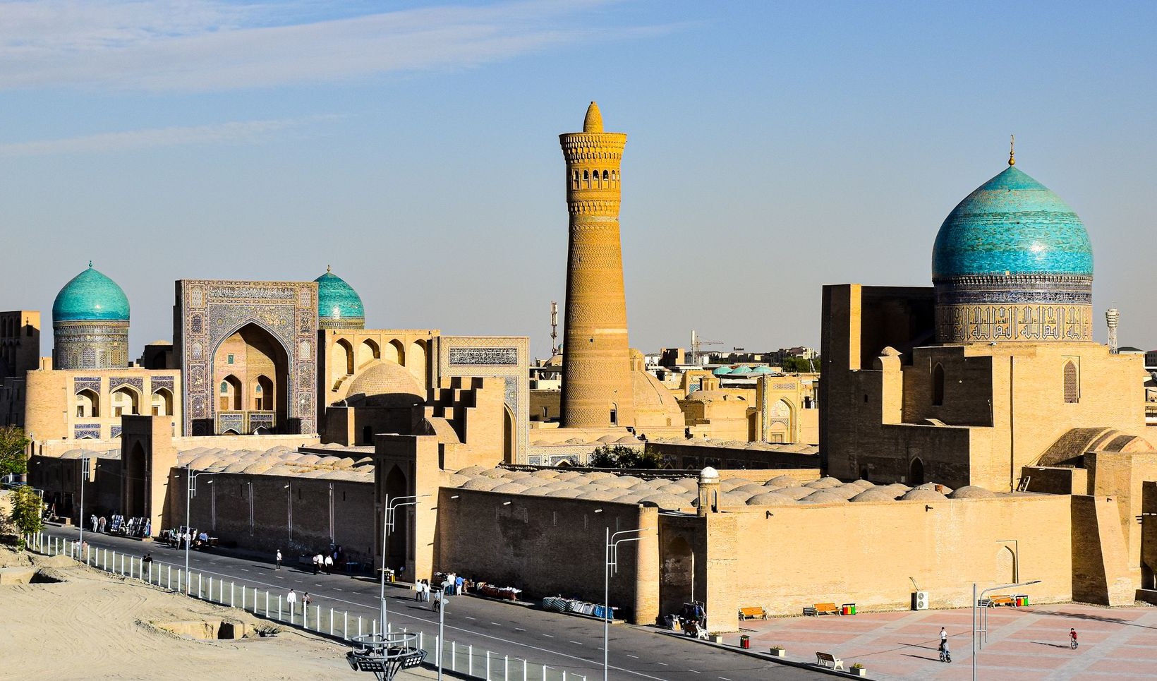 The Kalyan minaret and the turquoise domes of the Mir-i-Arab madrasa in Bukhara