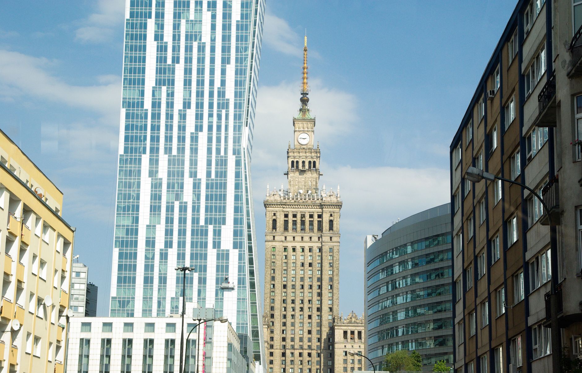 The Palace of Culture and Science standing among modern towers in central Warsaw